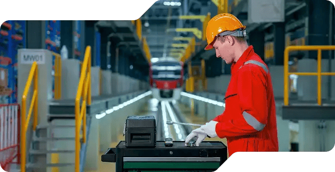 Worker with hard hat modifying tools